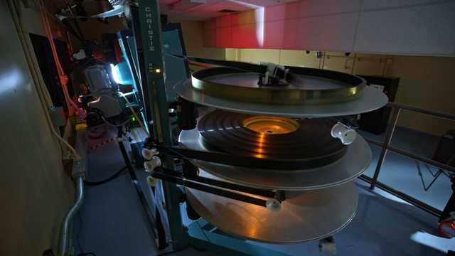 70mm film print loaded on a projection platter system