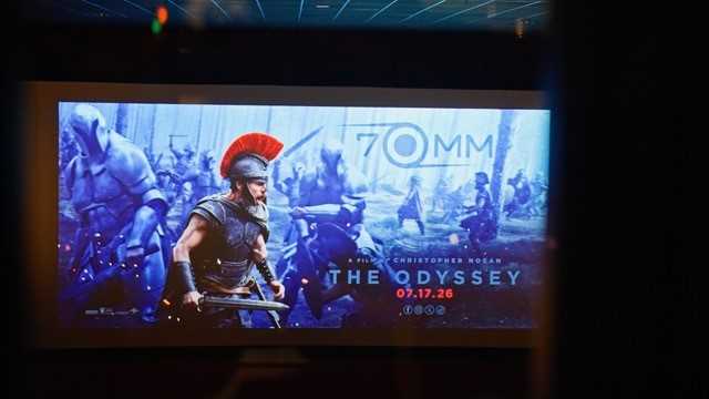 The Odyssey 70mm title card projected on a theater screen