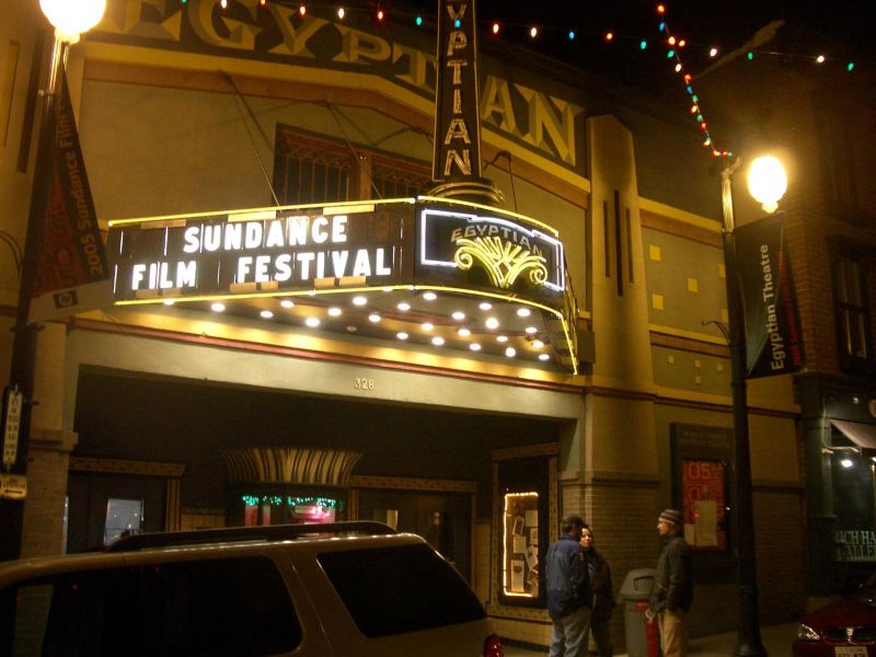 Egyptian Theatre marquee lit up for Sundance Film Festival at night