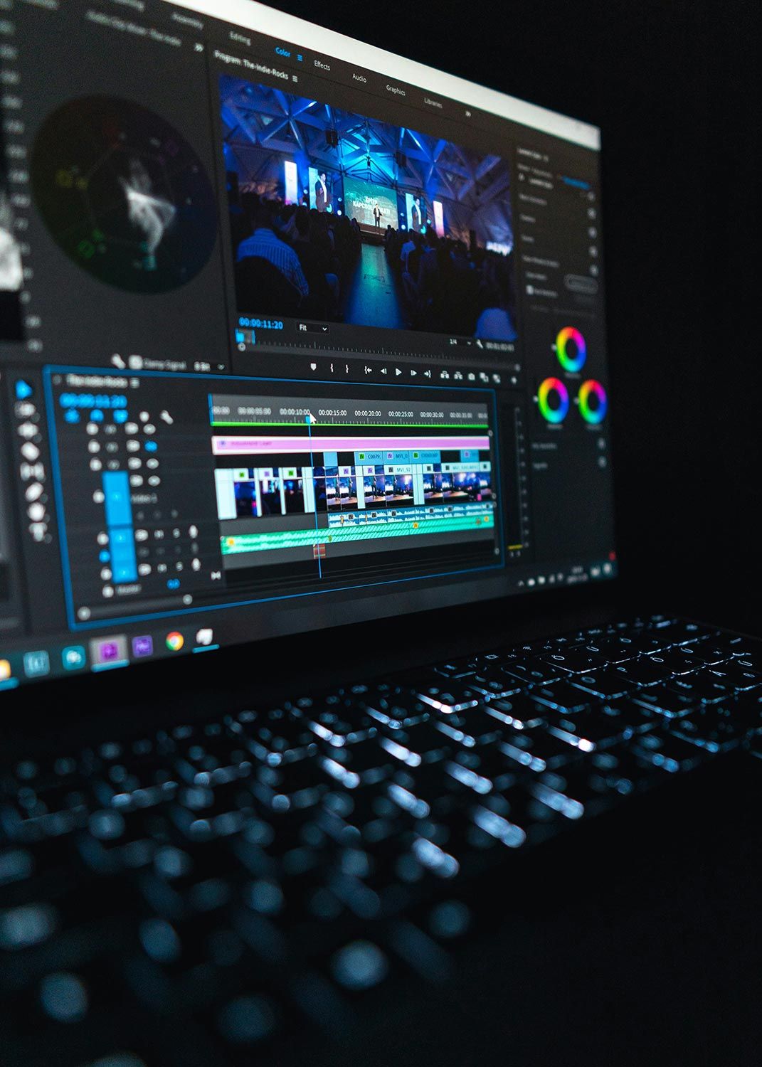 A computer screen displaying video editing software with a paused live-streamed event.